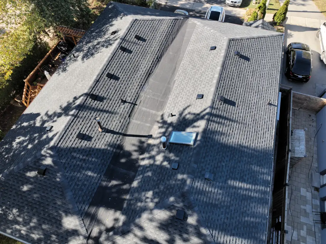 Drone view along the new roof on Bonnymede Drive, showing the hip lines, centre section and roof vents